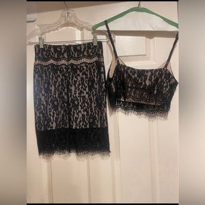 Two piece Bebe lace crop top and skirt